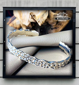 Armspange Koralliriutta als Korallenriff